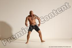 Underwear Gymnastic poses Man Black Muscular Bald Dancing Dynamic poses Academic